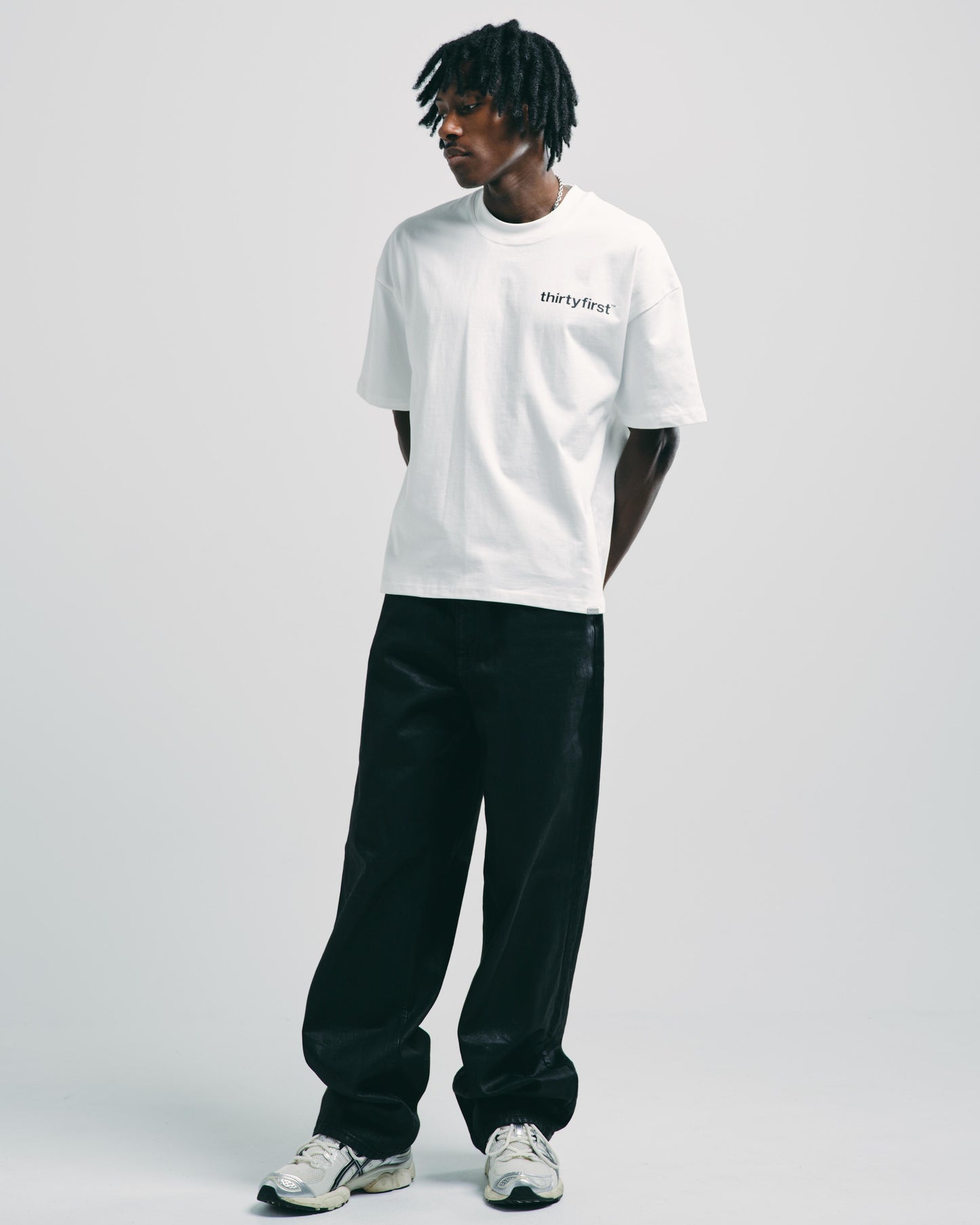 Full view of mens graphic tee showcasing the street style.